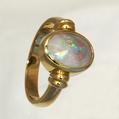 CUSTOM MADE 18k Yellow Gold Ring with a SOLID SEMI BLACK OPAL Rolling flashes of red to blue to green 